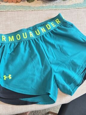 Under Armour Teal Women's Athletic Shorts with Neon Yellow Logo
